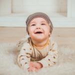 baby wearing cap